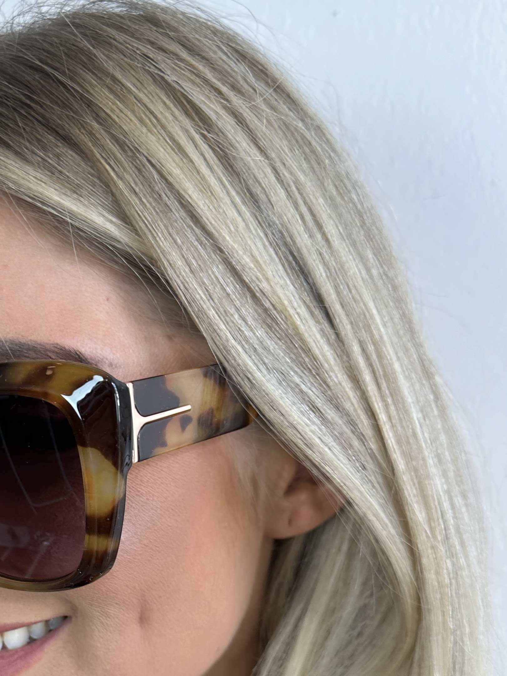 Iza - Solbriller i let cat-eye look